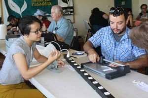 Andy-Etters-(JPL)-confers-with-collegue-about-an-item-fix