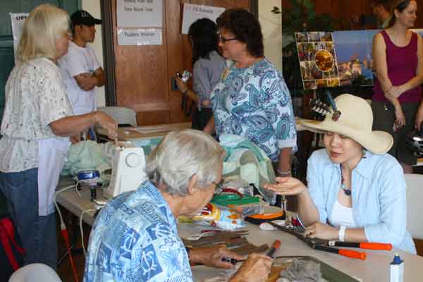 Knife sharpening and garment fixing @ Repair Cafe. It was held at the Pasaden Humane Society on Saturday