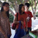 (R-L) Charley, a student exchange from China, came with Christie and her daughter Halie, from Altadena, to the Share Faire in Altadena