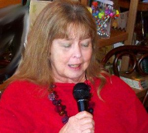 Mina Kirby reciting her poetry at Poets on-Site.