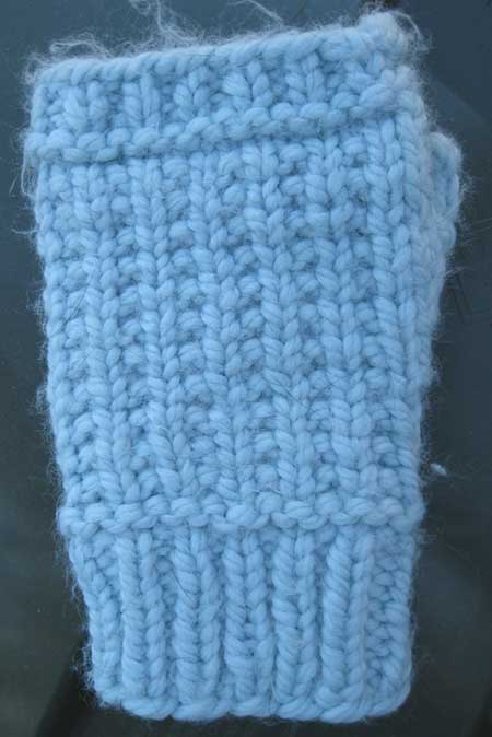 Fingerless mitt, blue (Photo - Robin Southworth).