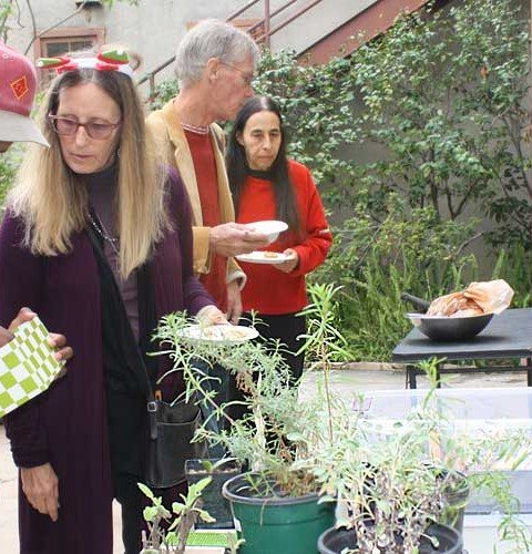 January Nordman (L), co-caretaker of Throop Learning Garden, at Repair Cafe seed exchange, 2015 (Photo _ Maelane Chan).